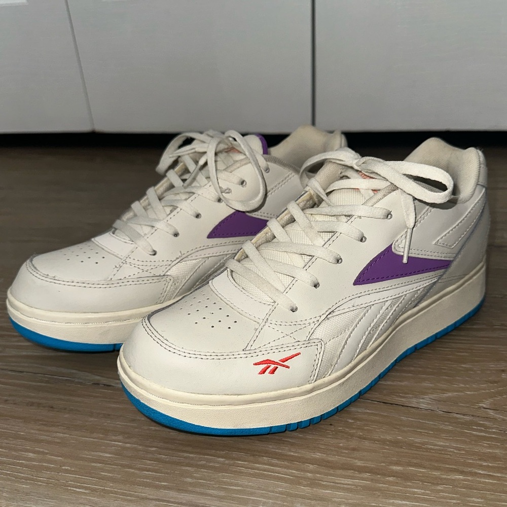 Reebok Cream Sneakers with Purple and Blue detailing
